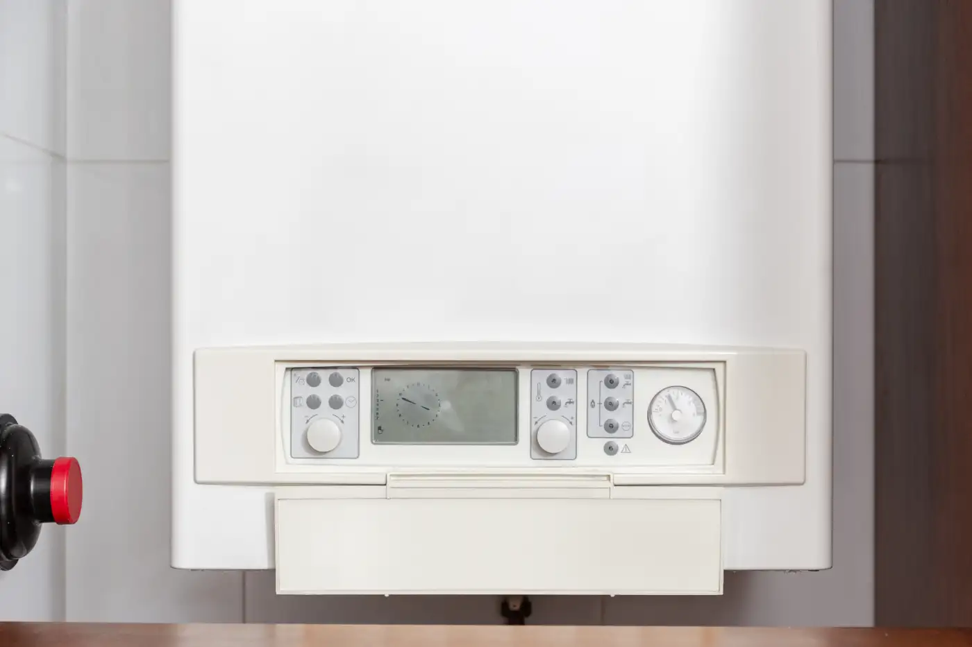 A combi boiler control panel showing the pressure gauge