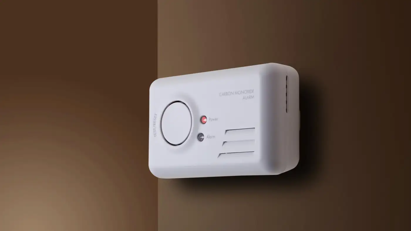 A carbon monoxide alarm mounted on a wall