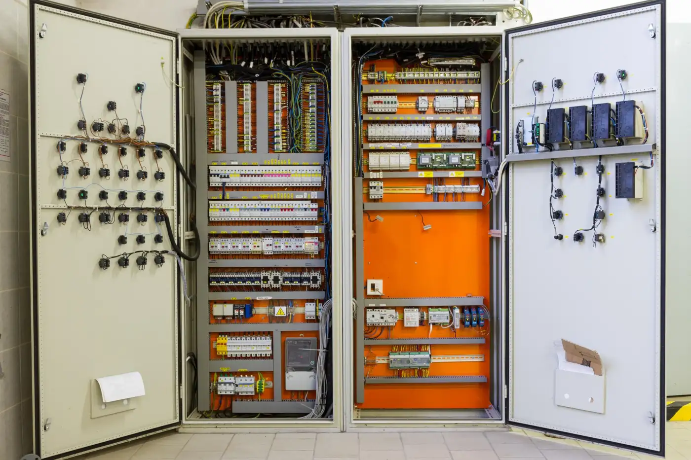 Electricity distribution box with wires, circuit breakers and fuse box components